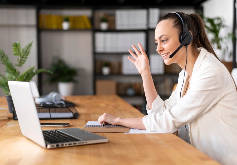 portrait-female-work-having-video-call_23-2148902302